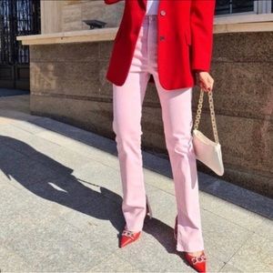 Pink high waisted ankle slit flare jeans